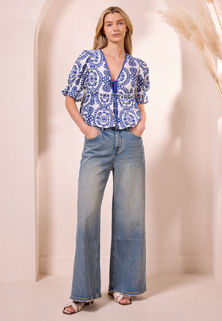 White Peplum Top with Blue Embroidery Print